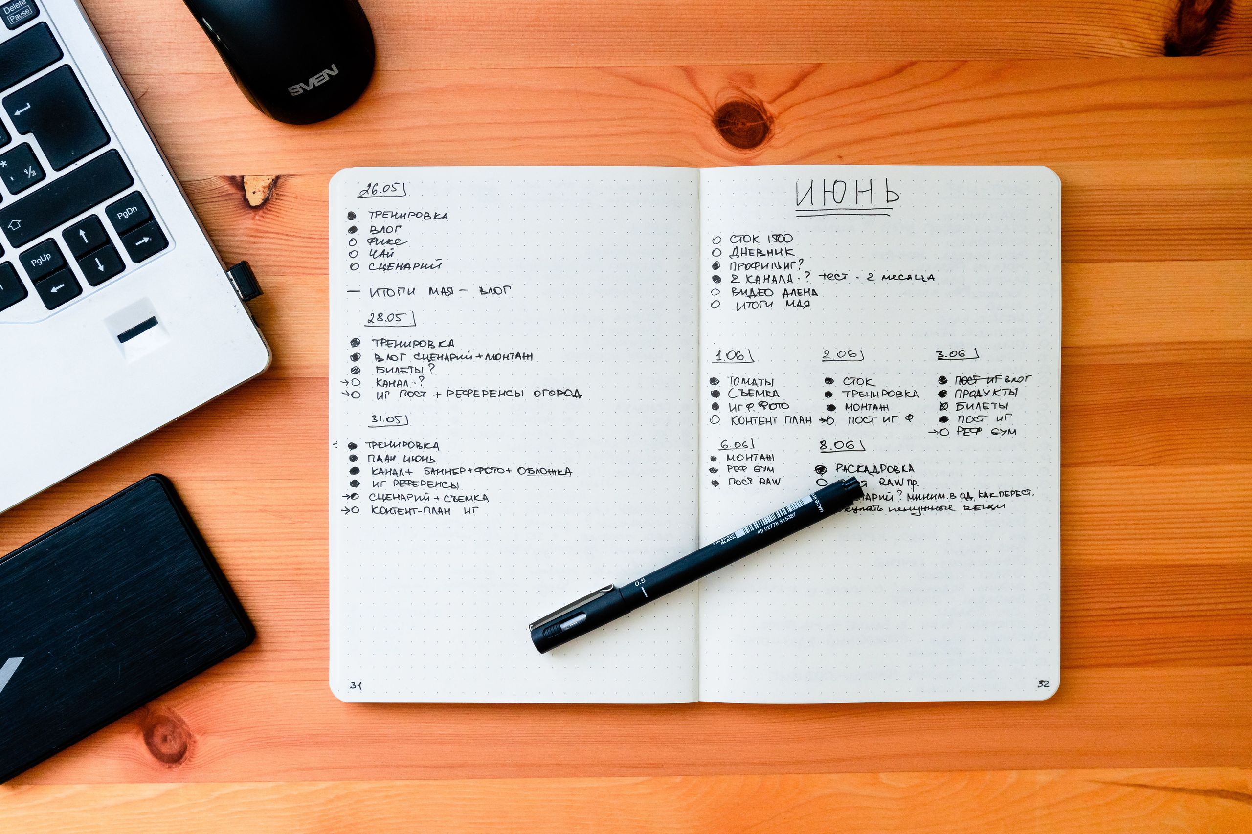 Notebook and pen on a work desk representing thoughtful planning